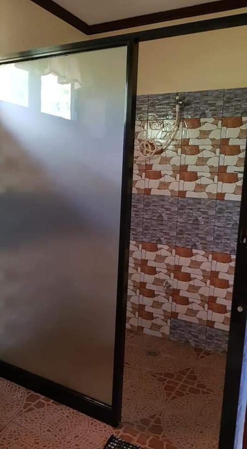 Paco'S Garden Home Stay Mambajao Exterior photo
