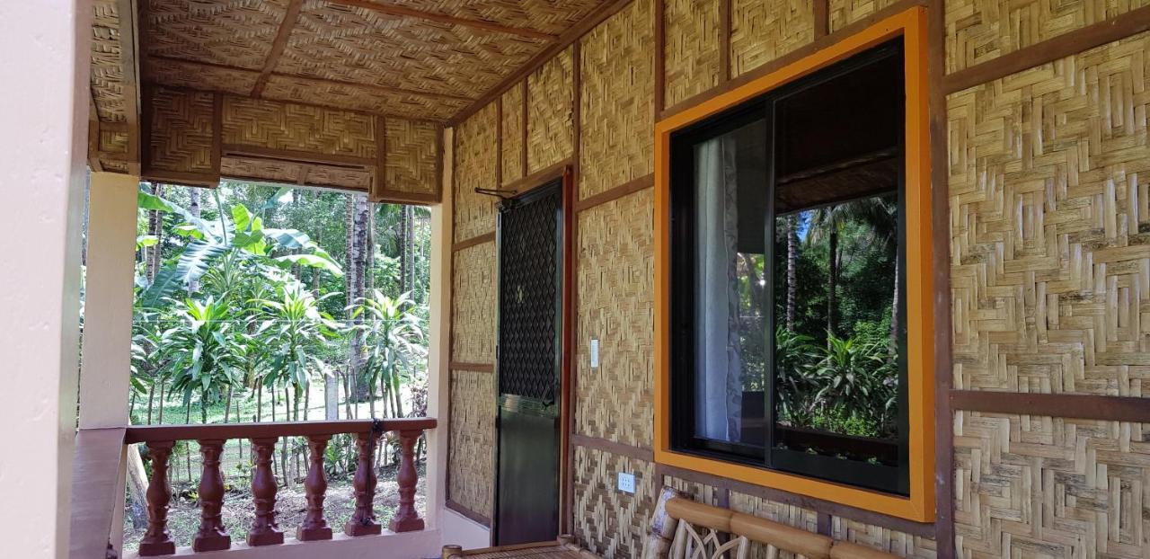 Paco'S Garden Home Stay Mambajao Exterior photo