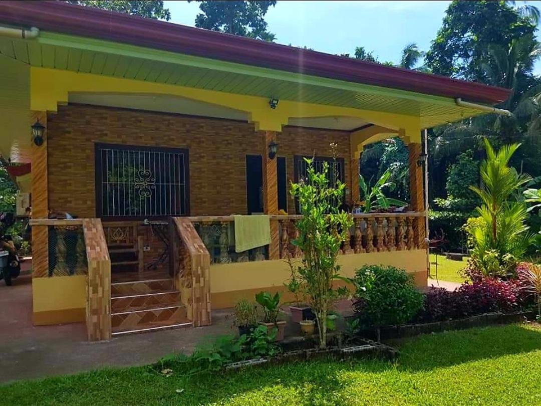 Paco'S Garden Home Stay Mambajao Exterior photo
