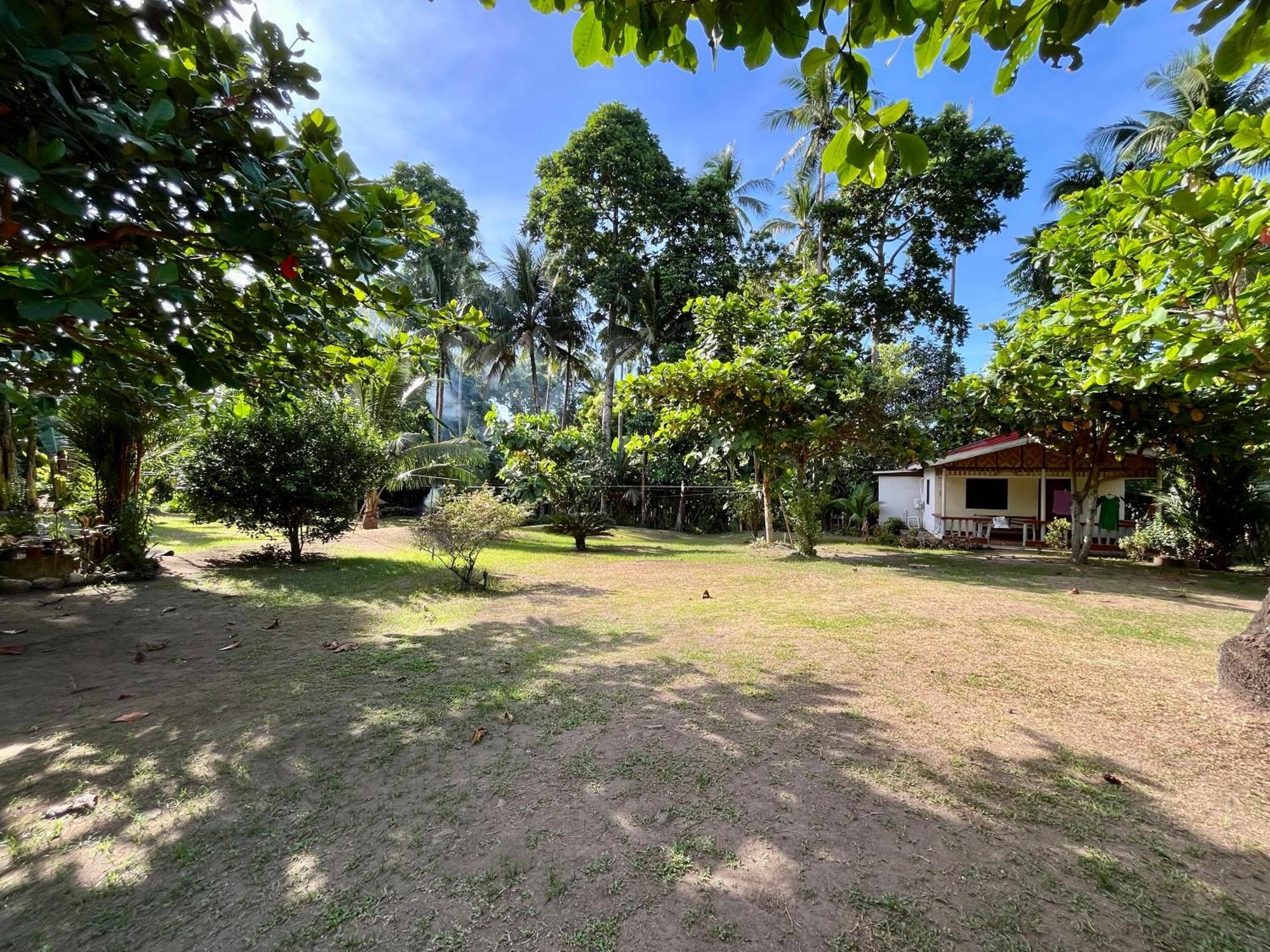 Paco'S Garden Home Stay Mambajao Exterior photo