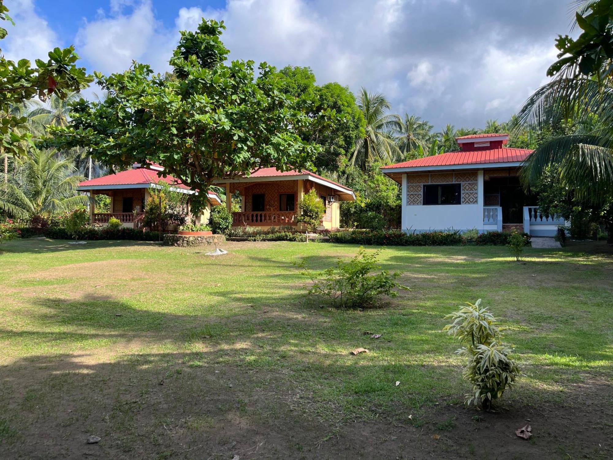 Paco'S Garden Home Stay Mambajao Exterior photo
