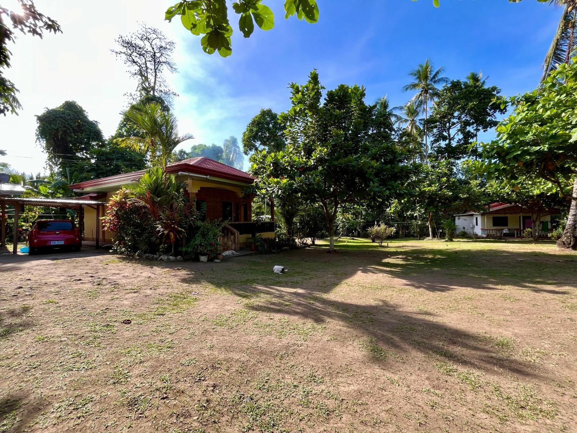 Paco'S Garden Home Stay Mambajao Exterior photo
